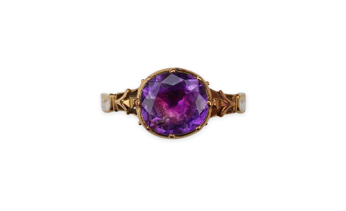 A rare and unusual George III amethyst and enamel mourning ring, late 18th century